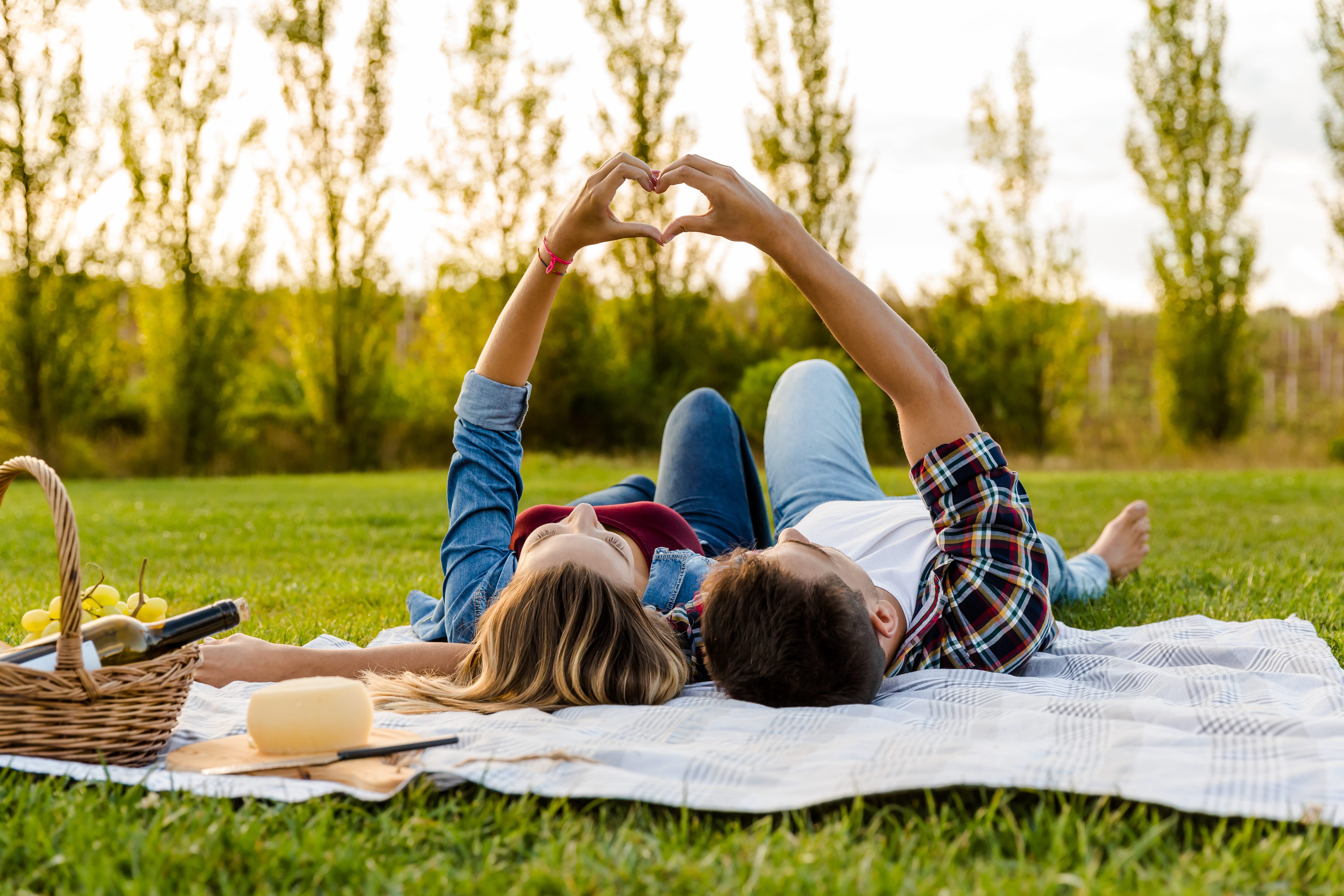 Couple on a picnic blanket
